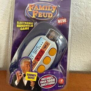 Family Feud Electronic Handheld Game. New in package.